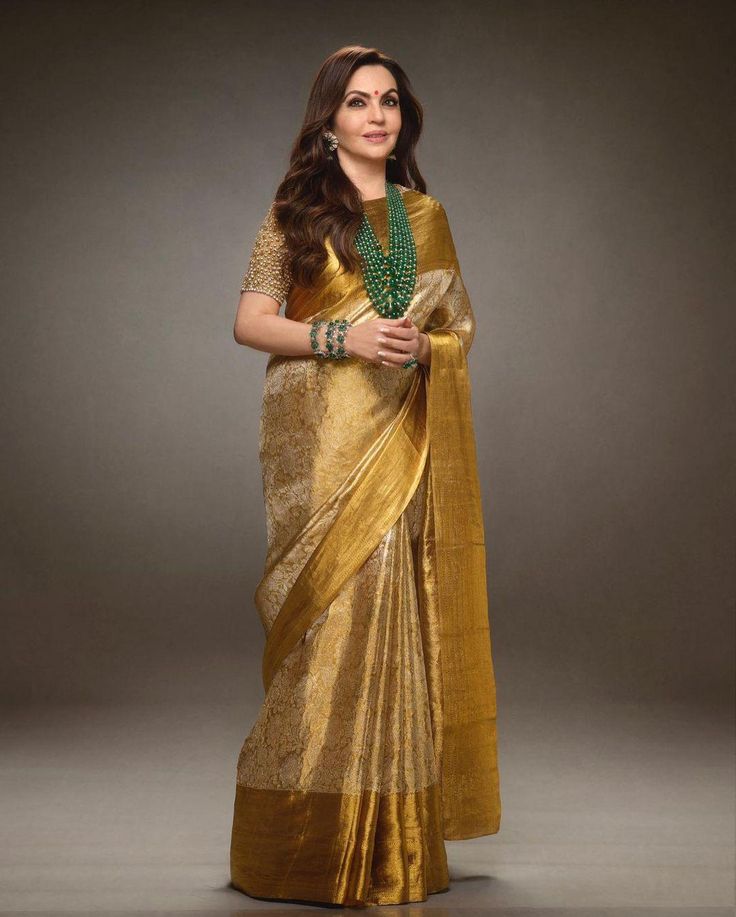 Alluring Golden Soft Tissue Silk Saree With Jazzy Blouse Piece
