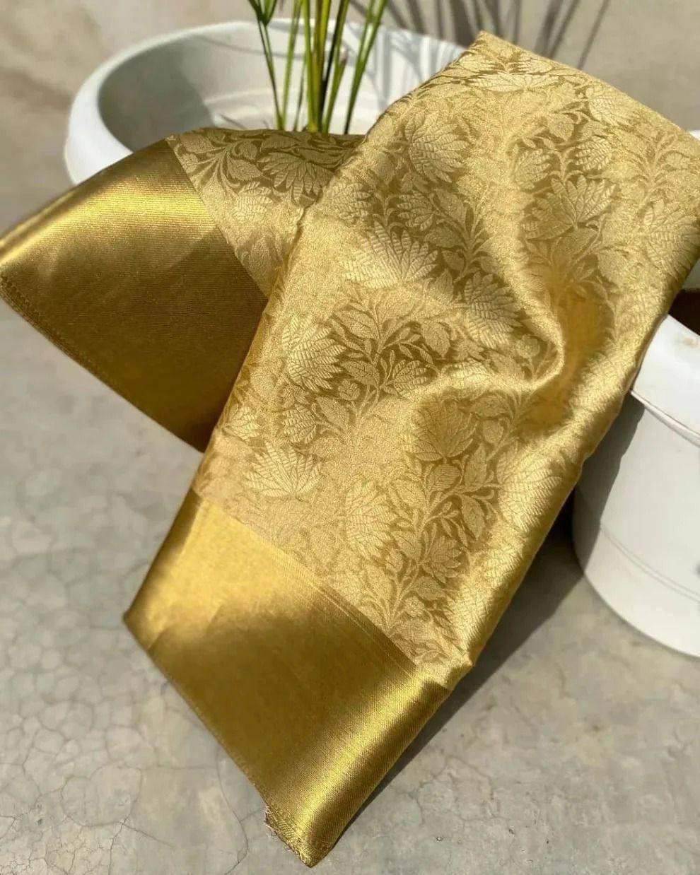 Alluring Golden Soft Tissue Silk Saree With Jazzy Blouse Piece