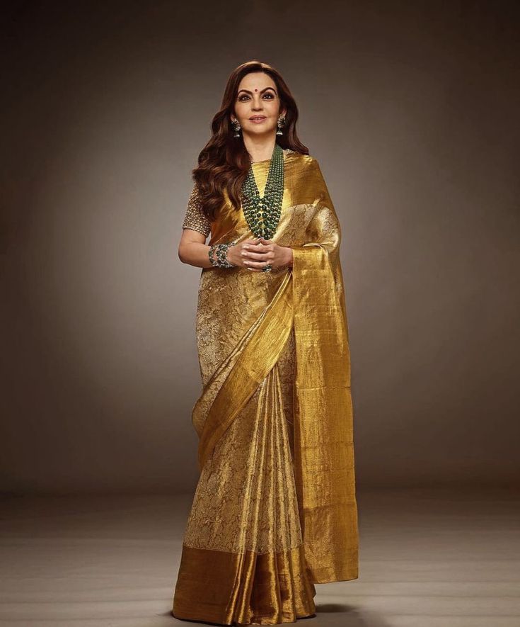 Alluring Golden Soft Tissue Silk Saree With Jazzy Blouse Piece