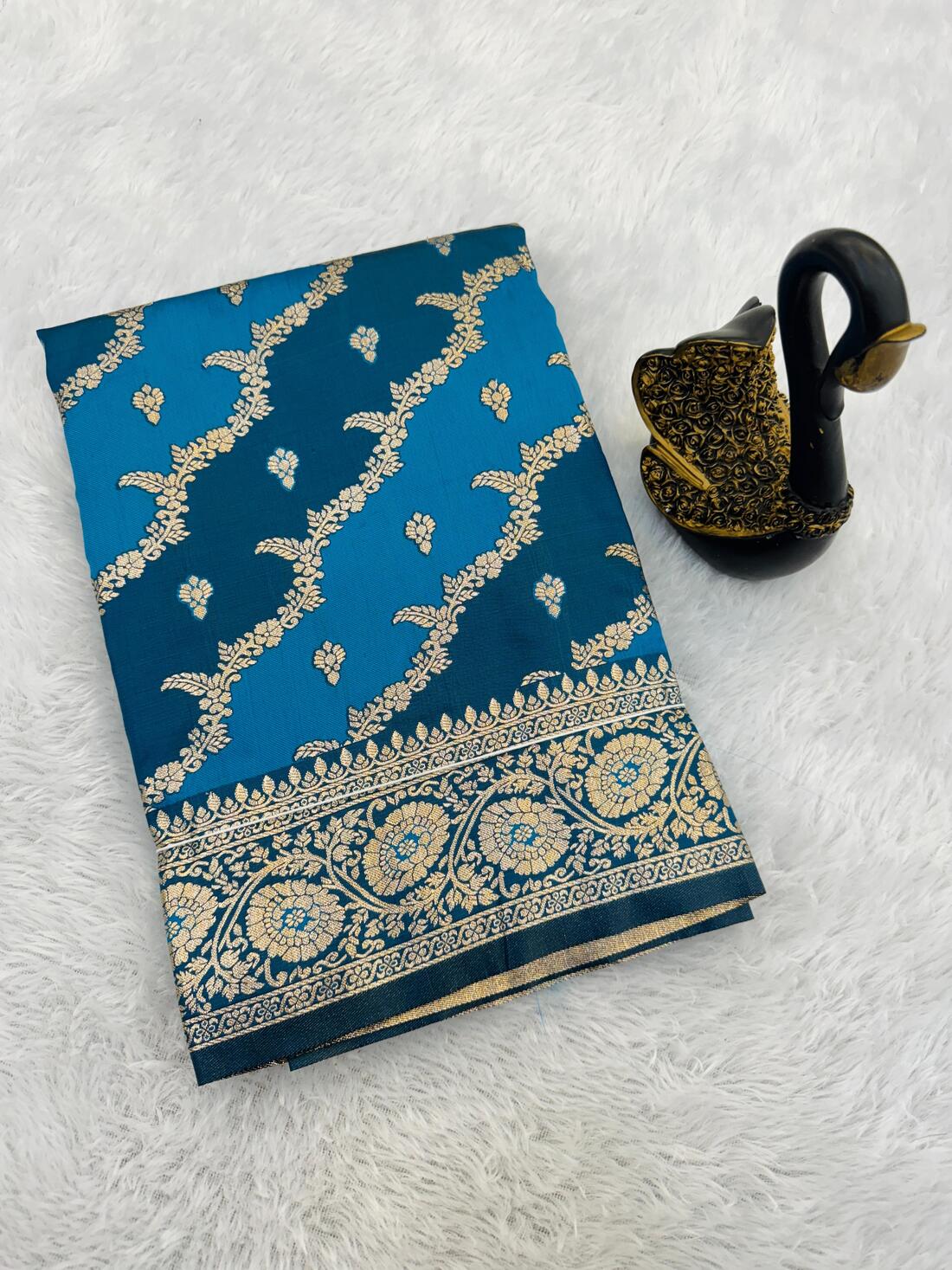 Mesmeric Blue Soft Banarasi Silk Saree With Exquisite Blouse Piece