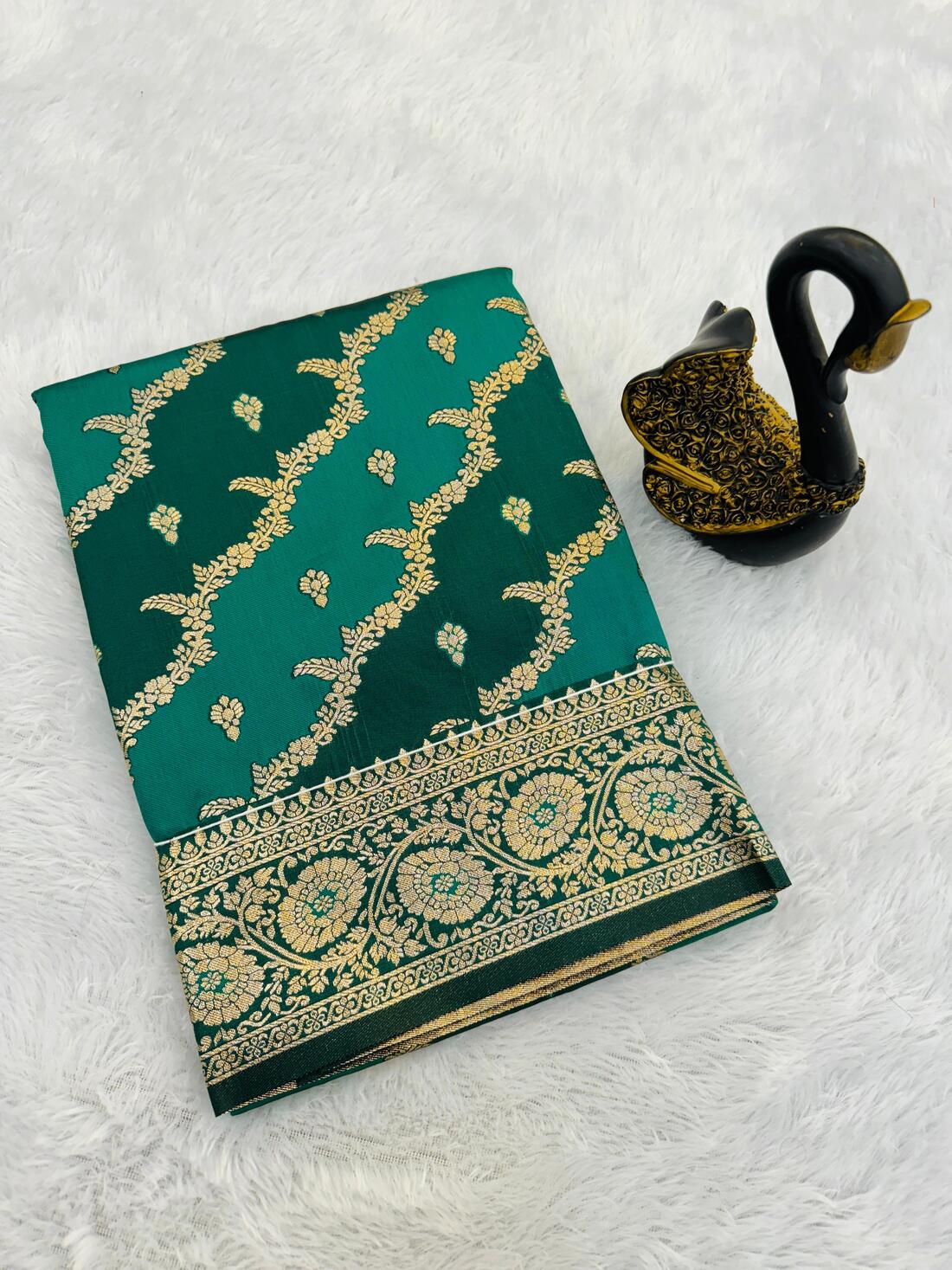 Majesty Sea Green Soft Banarasi Silk Saree With Classy Blouse Piece