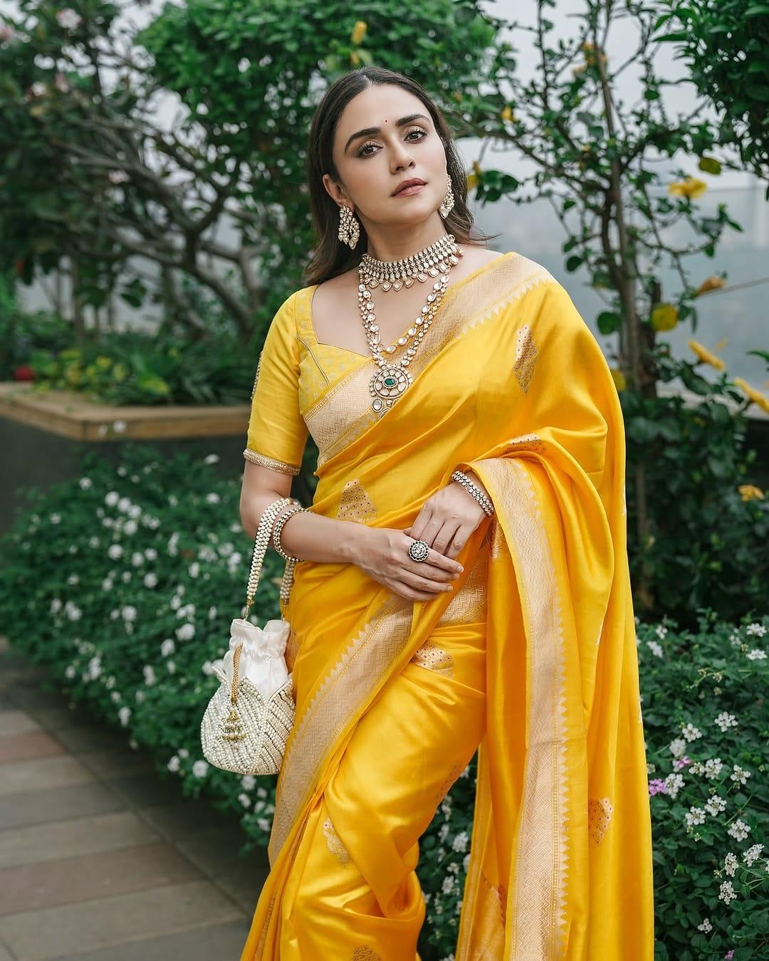 Aplomb Yellow Soft Silk Saree With Capricious Blouse Piece