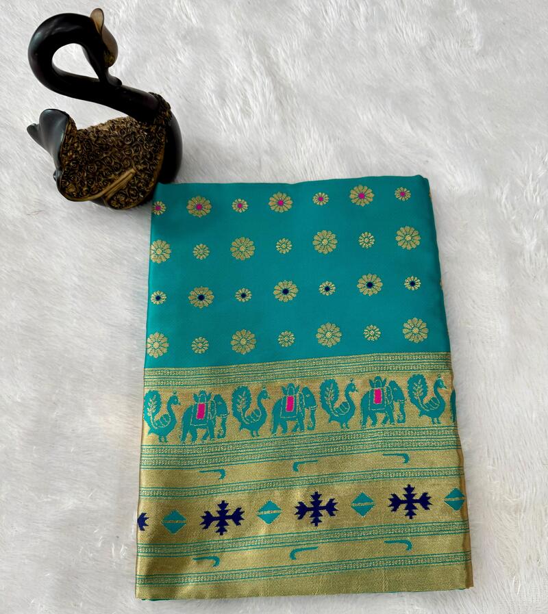 Alluring Turquoise Paithani Silk Saree With Amazing Blouse Piece