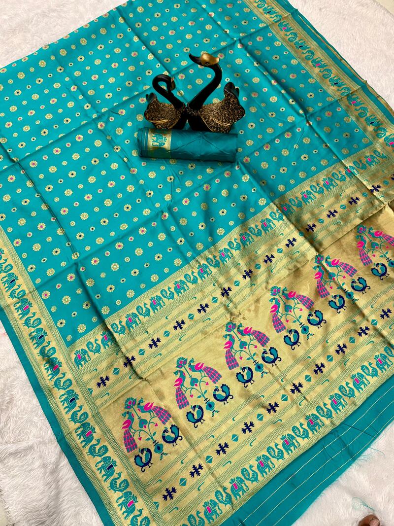 Alluring Turquoise Paithani Silk Saree With Amazing Blouse Piece