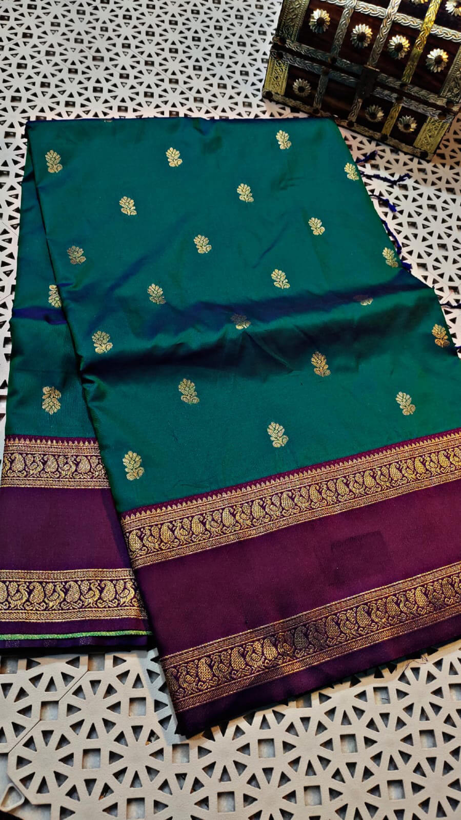 Symmetrical Rama Soft Banarasi Silk Saree With Captivating Blouse Piece