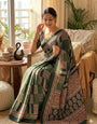 Forbearance Green Ajrakh Printed Dola Silk Saree With Divine Blouse Piece