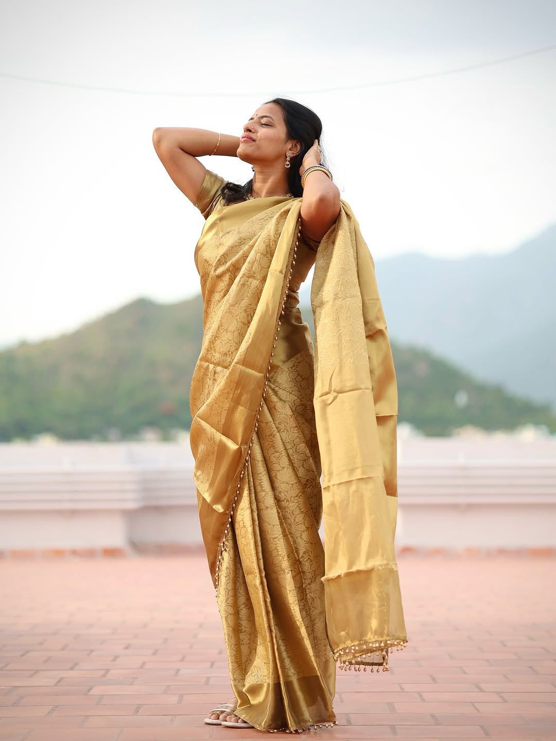 Flamboyant Golden Soft Tissue Silk Saree With Gossamer Blouse Piece