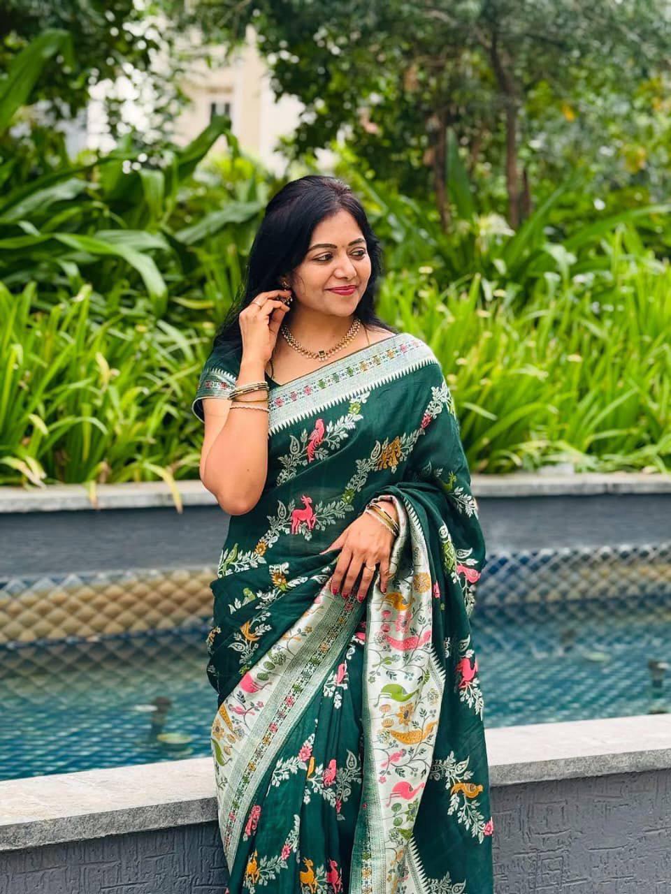 Rhapsody Green Soft Banarasi Silk Saree With Gossamer Blouse Piece