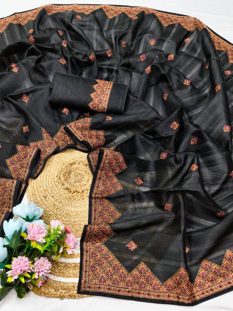 Opulent Black Embroidery Work Tussar Silk Saree With Symmetrical Blouse Piece