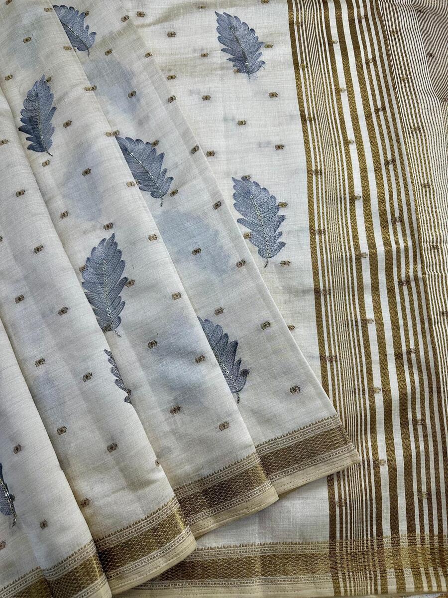 Unique Off White Embroidery Work Tussar Silk Saree With Excellent Blouse Piece