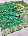 Bewitching Green Soft Banarasi Silk Saree With Woebegone Blouse Piece