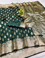 Flameboyant Dark Green Soft Banarasi Silk Saree With Gleaming Blouse Piece