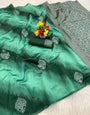 Eloquence Turquoise Soft Silk Saree With Delightful Blouse Piece